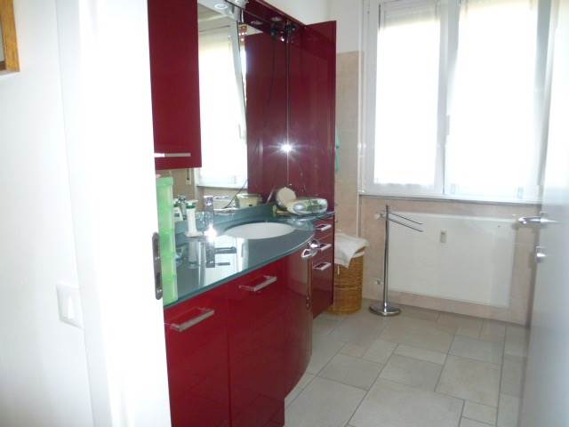 Elegante trilocale con balconi e box