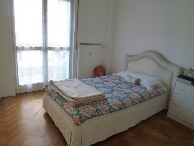 Elegante trilocale con balconi e box