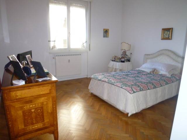 Elegante trilocale con balconi e box