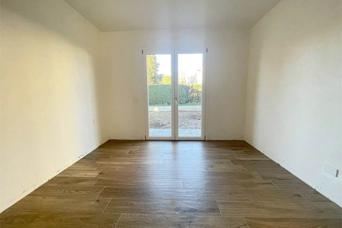 Nuovo trilocale con giardino e box