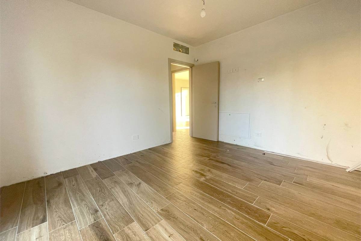 Nuovo trilocale con giardino e box