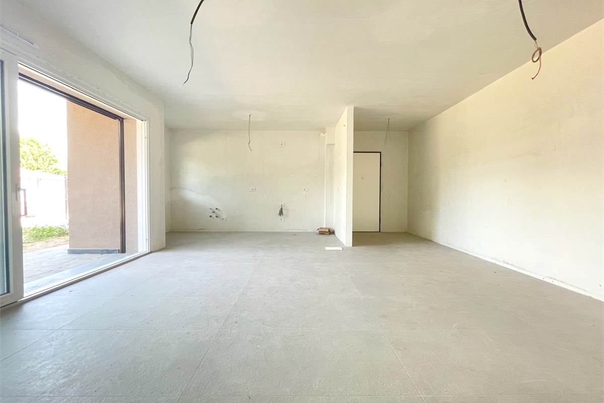 Nuovo trilocale con giardino 