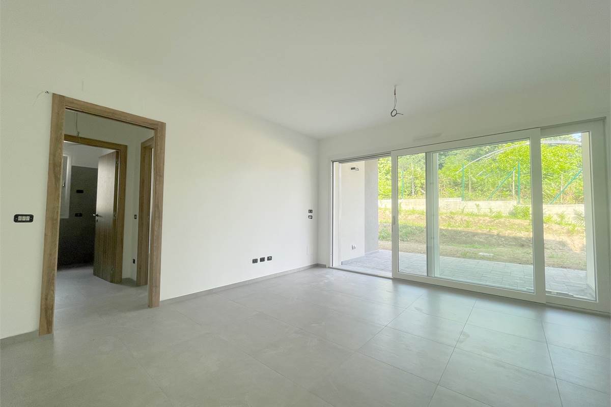 Nuovo trilocale con giardino