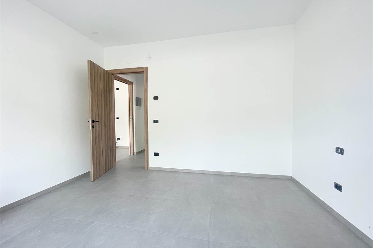 Nuovo trilocale con giardino