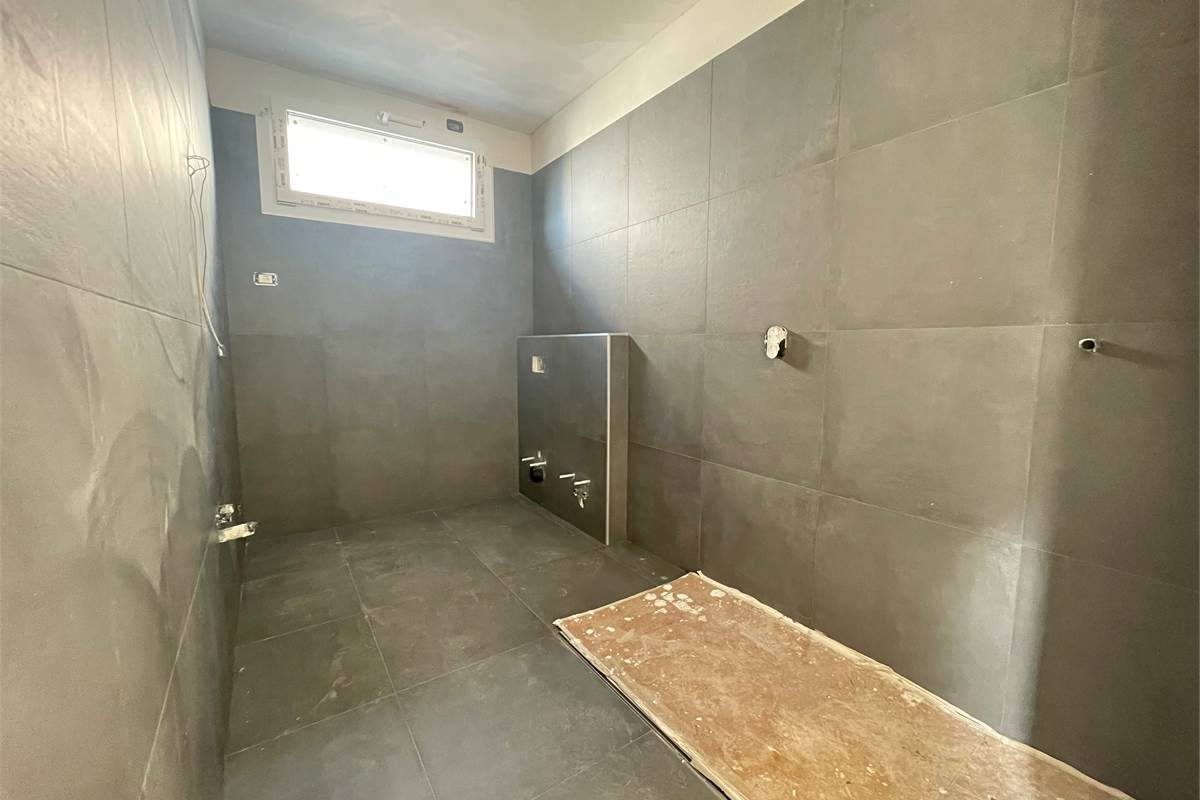 Nuovo trilocale con giardino 