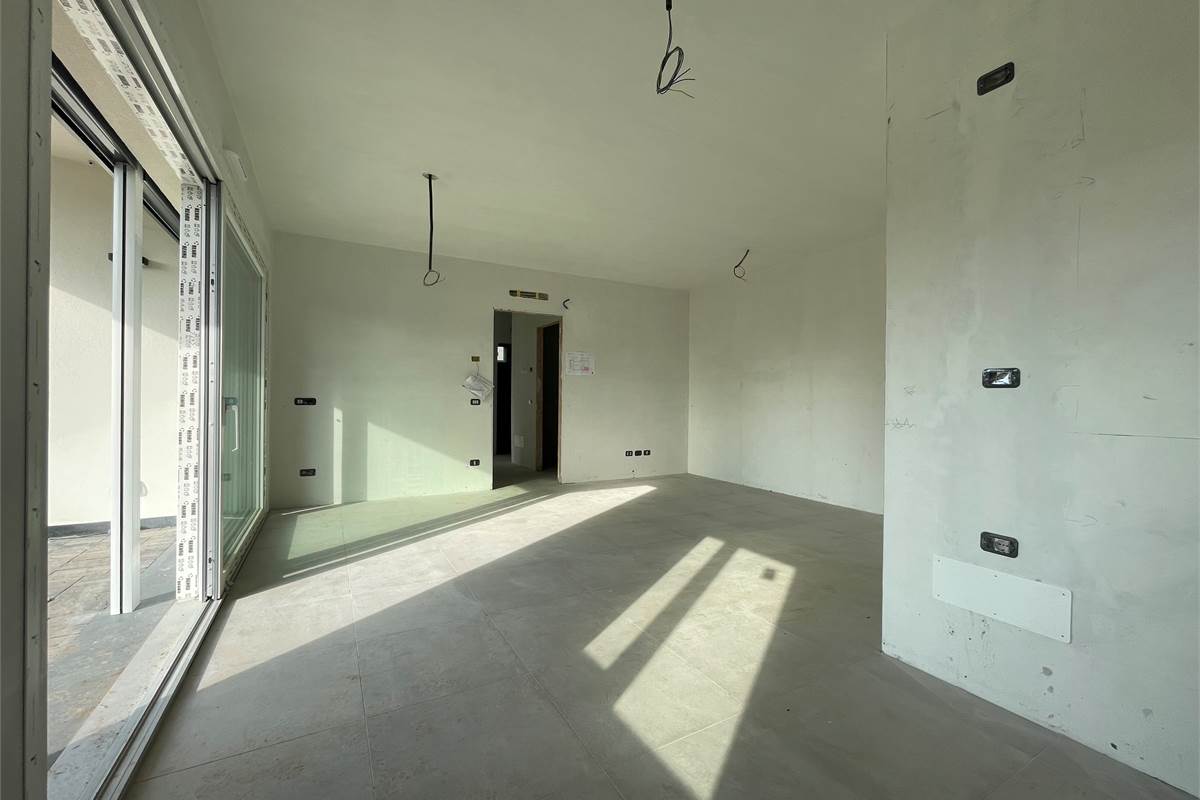 Nuovo trilocale con giardino 