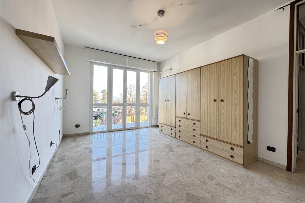 Bilocale con terrazzo e box