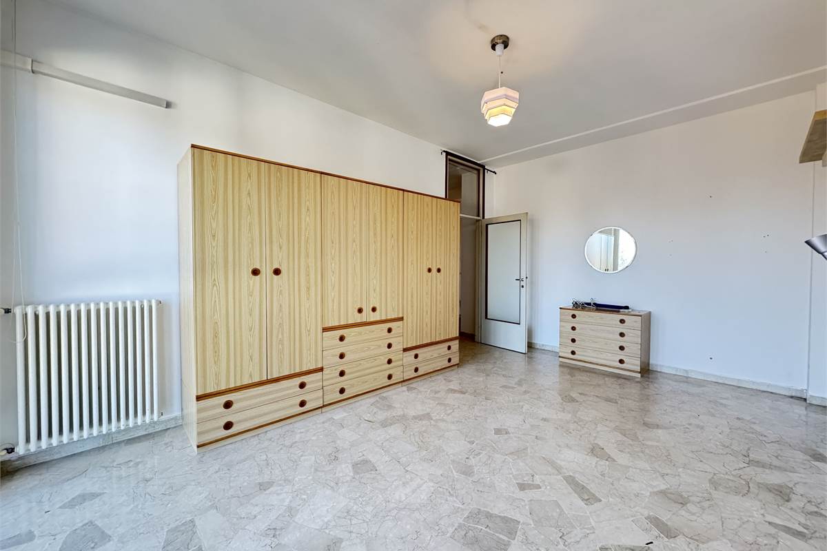 Bilocale con terrazzo e box