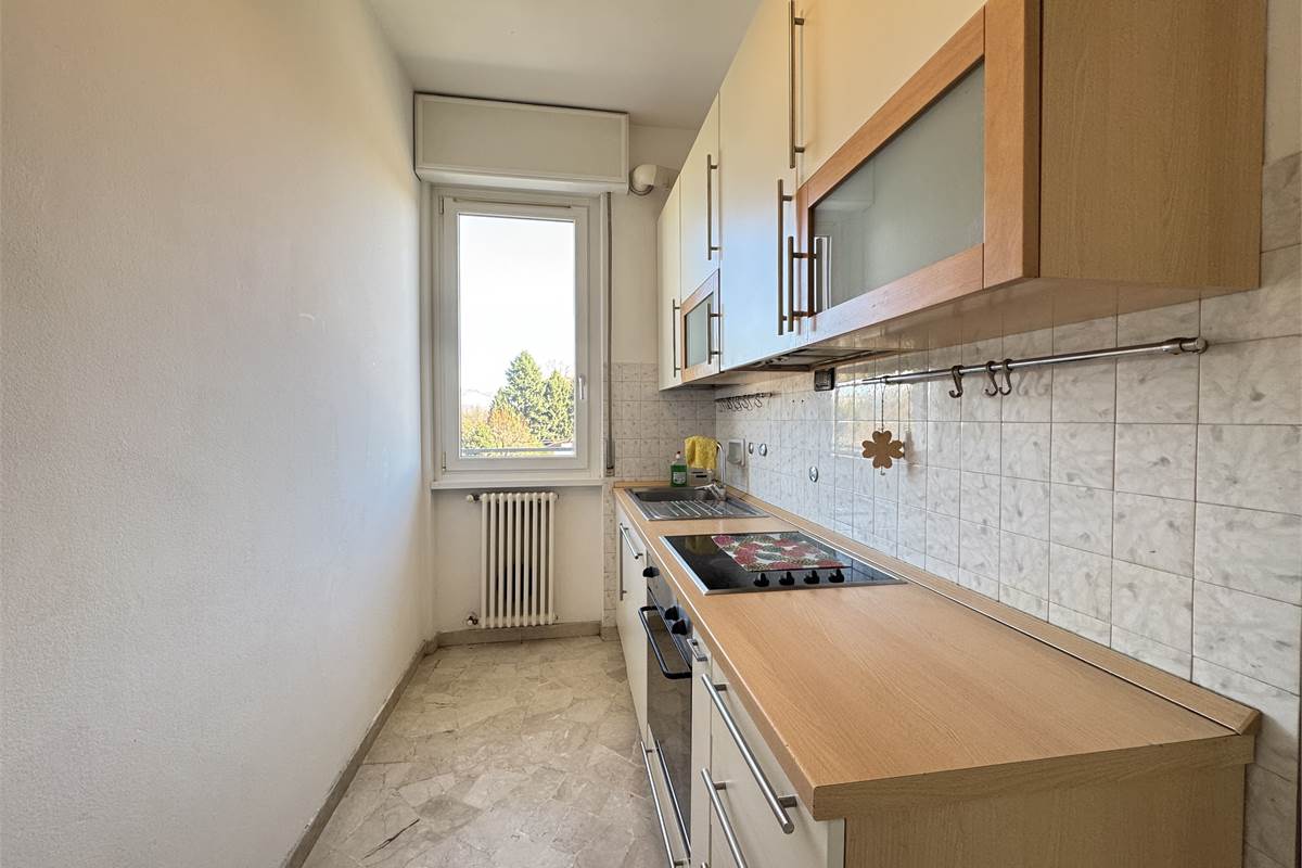 Bilocale con terrazzo e box