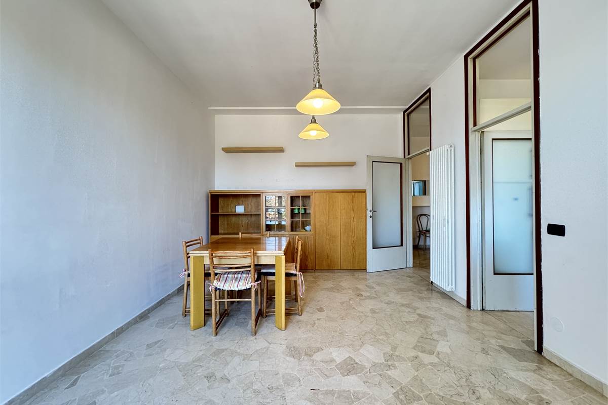 Bilocale con terrazzo e box