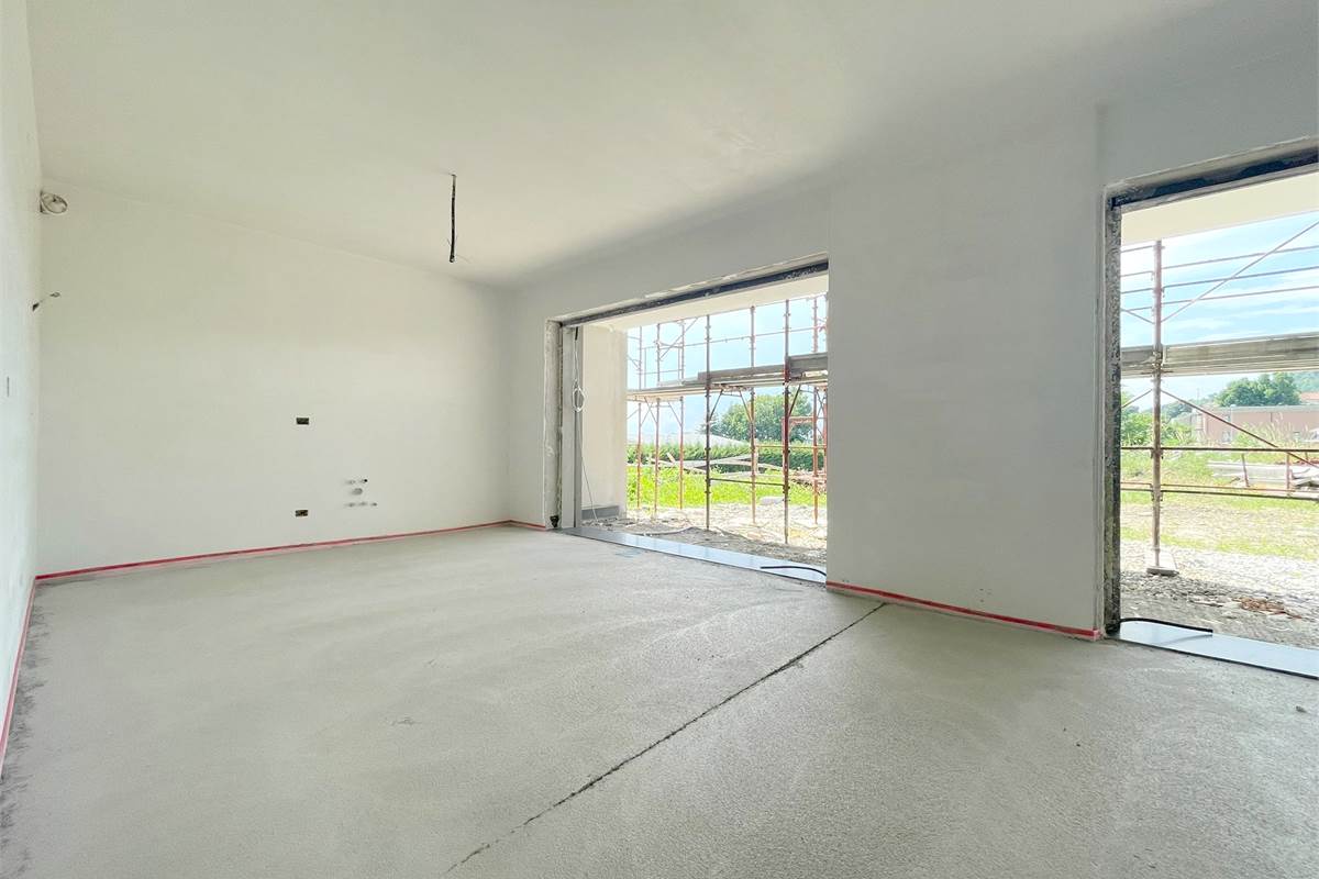 Nuovo quadrilocale con giardino con BOX incluso