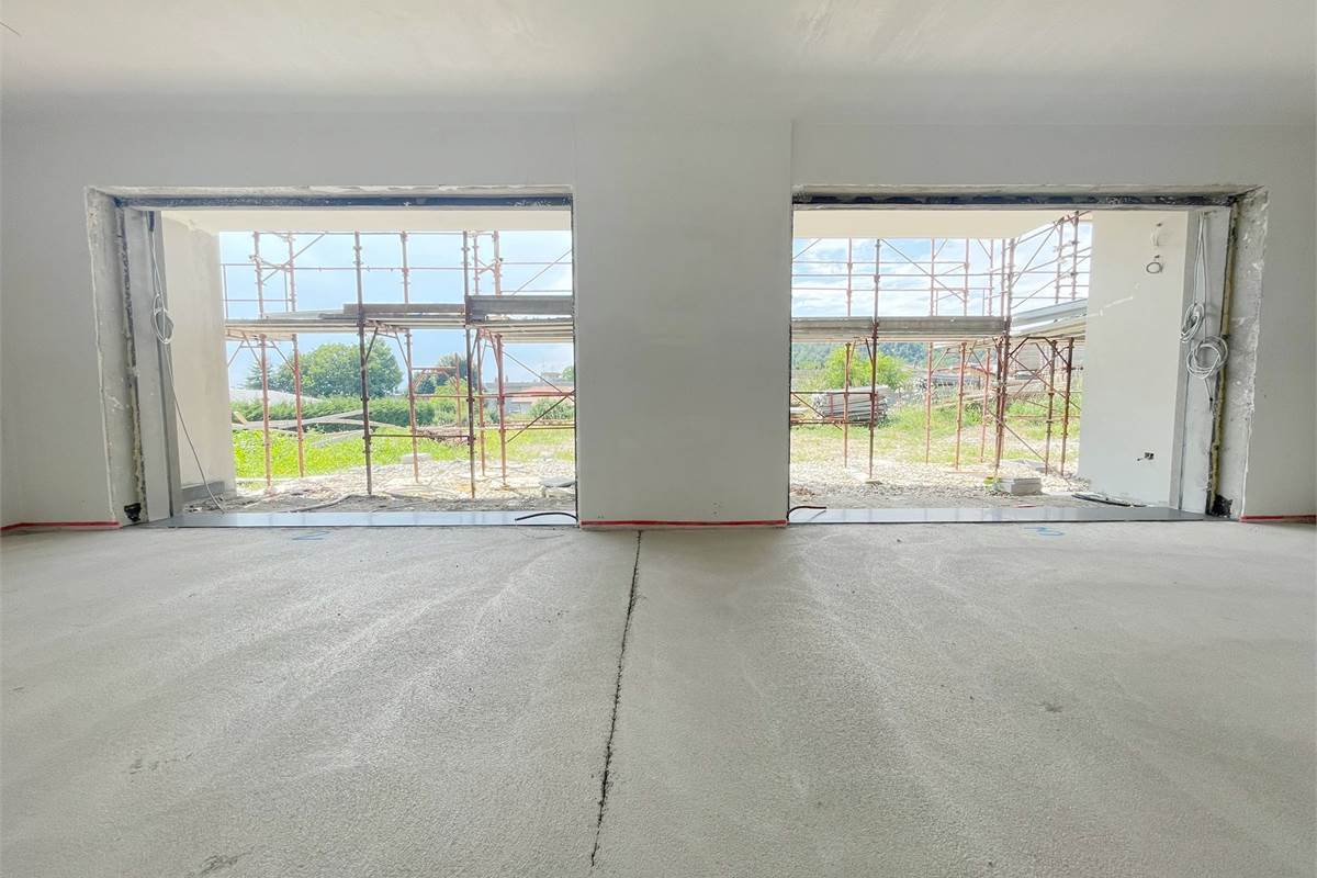 Nuovo quadrilocale con giardino con BOX incluso