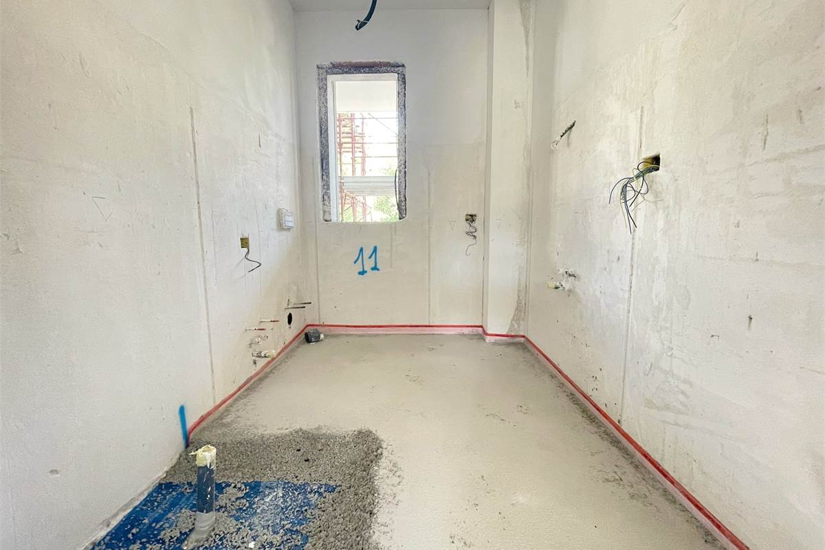 Nuovo quadrilocale con giardino con BOX incluso