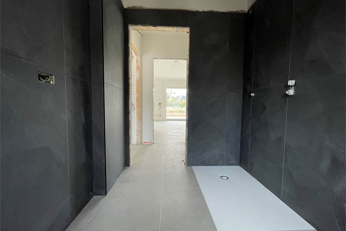 Nuovo trilocale con giardino e box