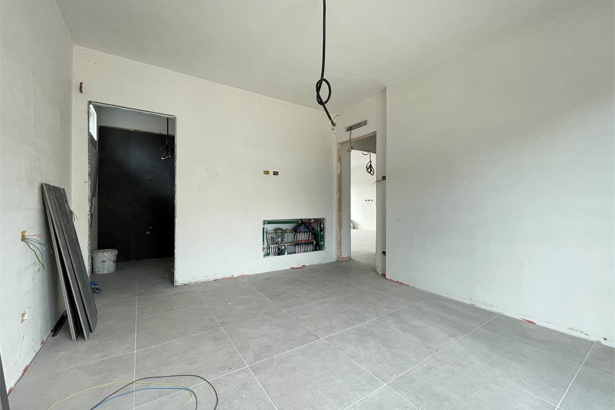 Nuovo trilocale con giardino e box