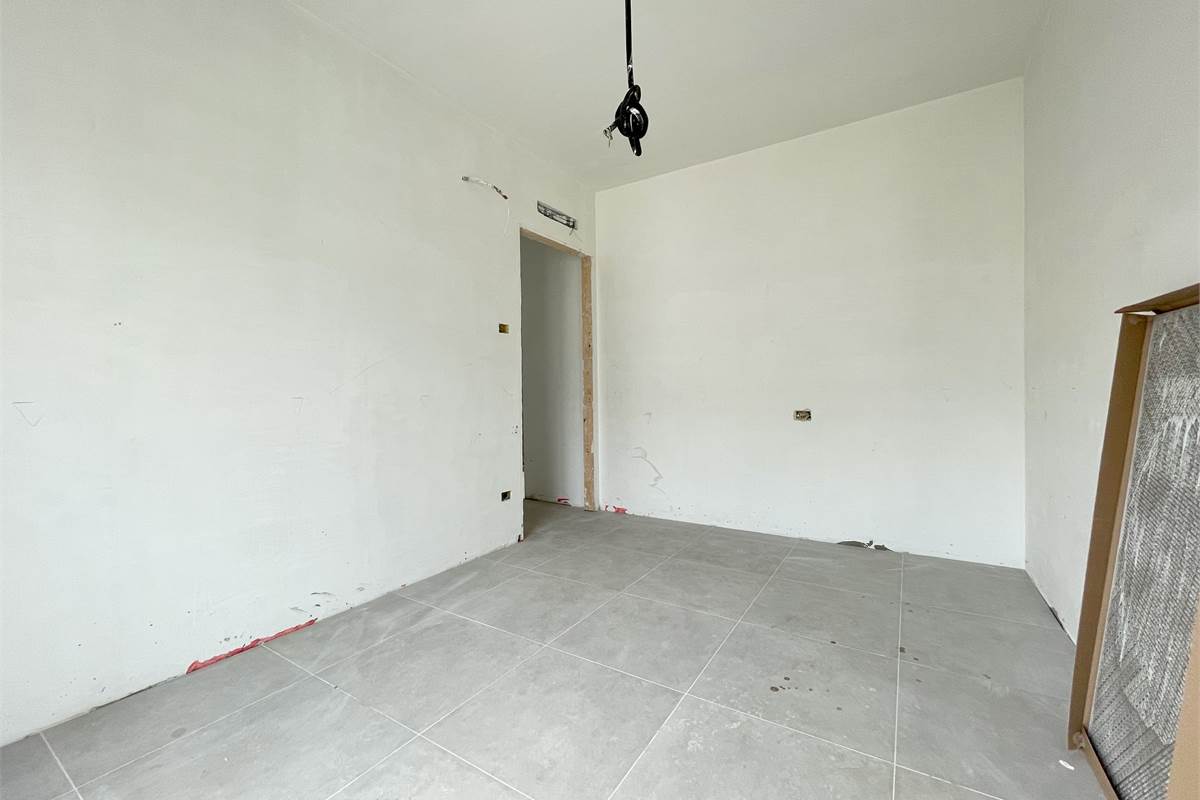 Nuovo trilocale con giardino e box