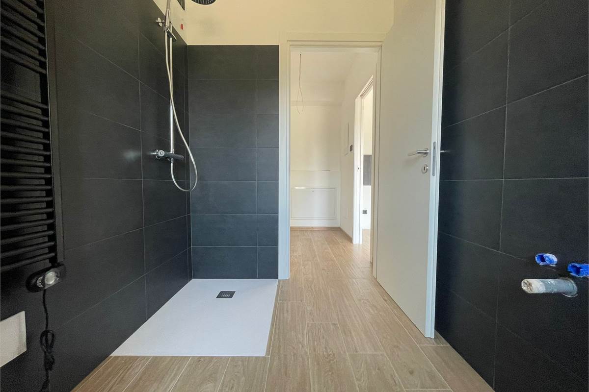 Nuovo bilocale con giardino e box