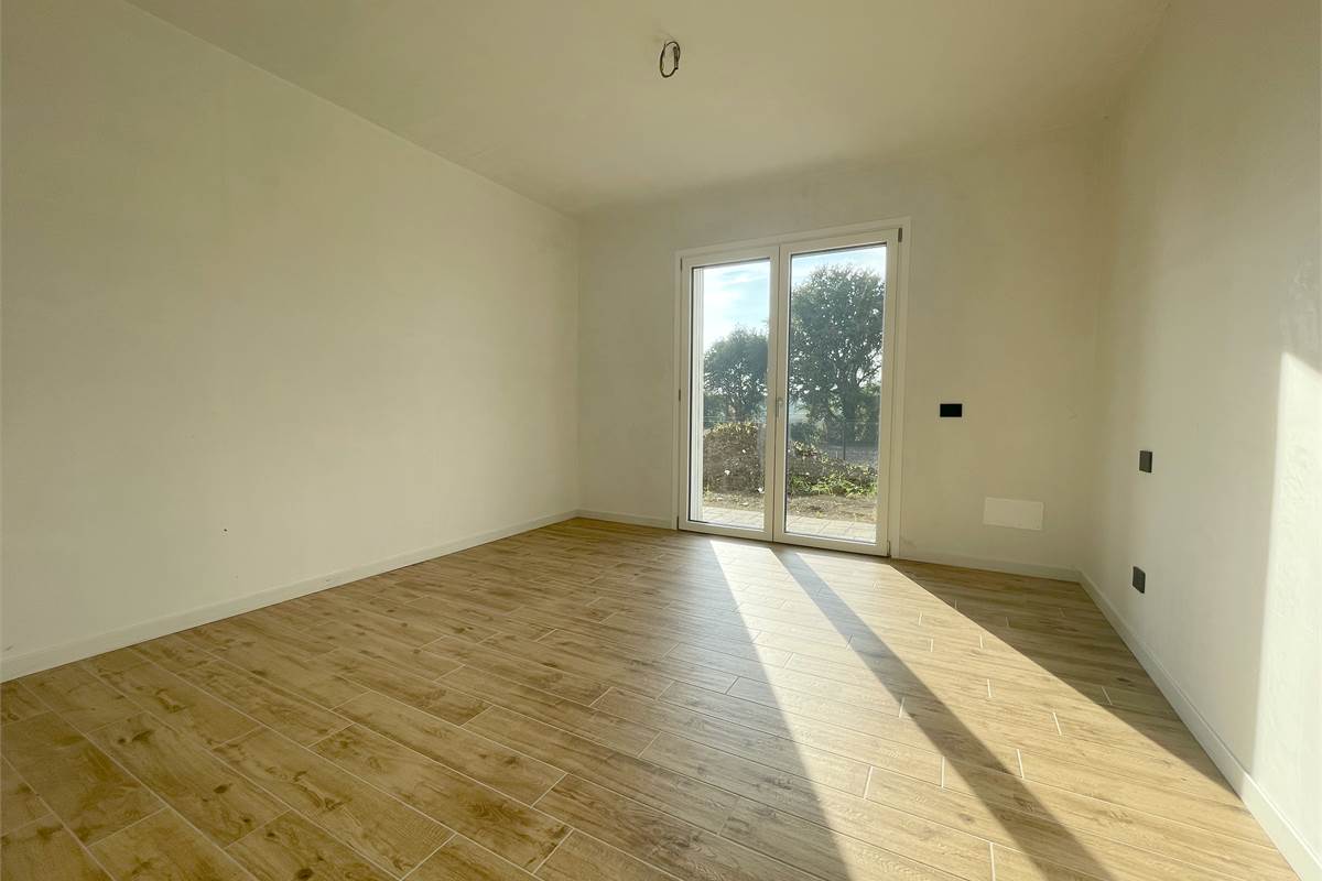 Nuovo bilocale con giardino e box