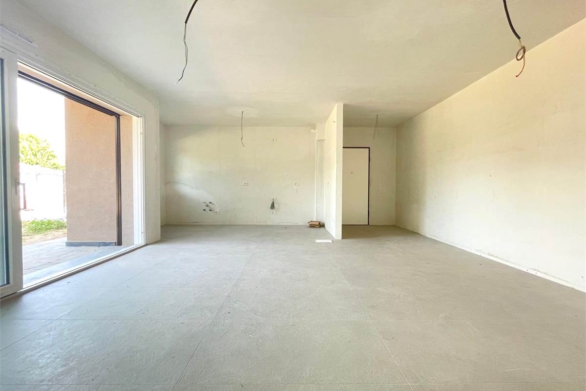 Nuovo trilocale con giardino 