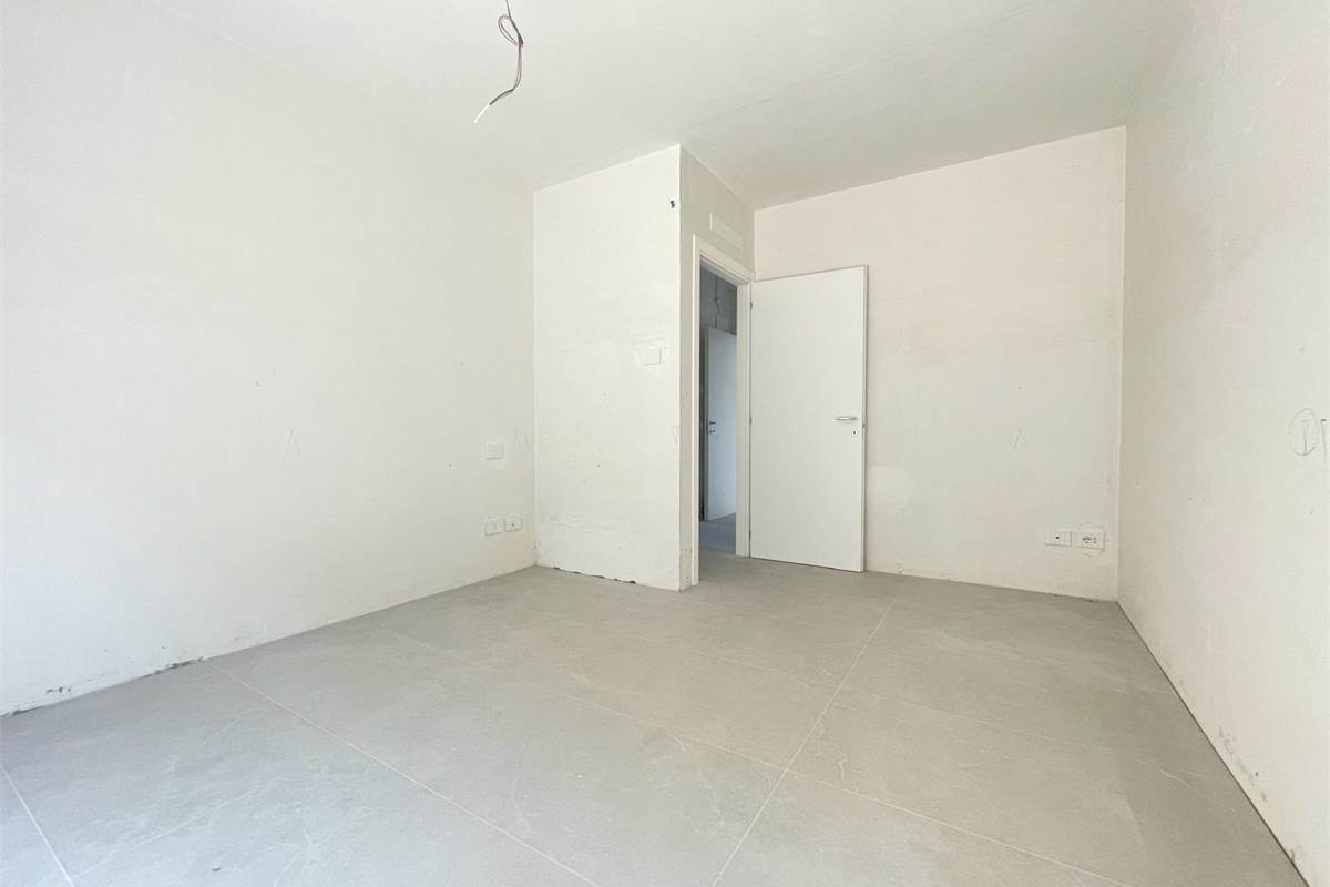 Nuovo trilocale con giardino 