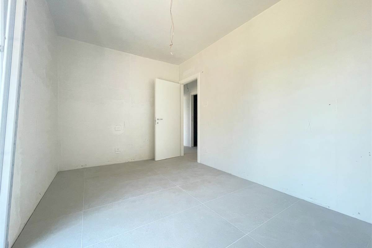 Nuovo trilocale con giardino 