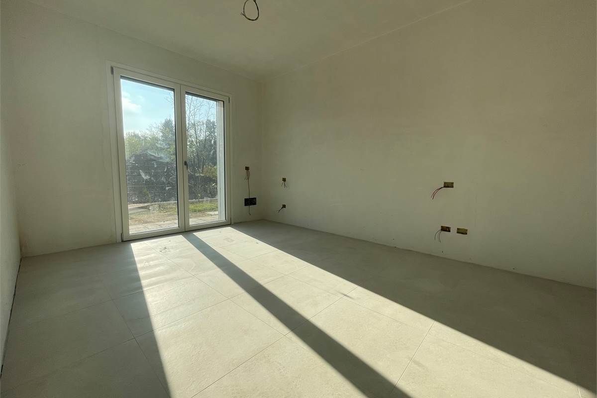 Nuovo trilocale con giardino 