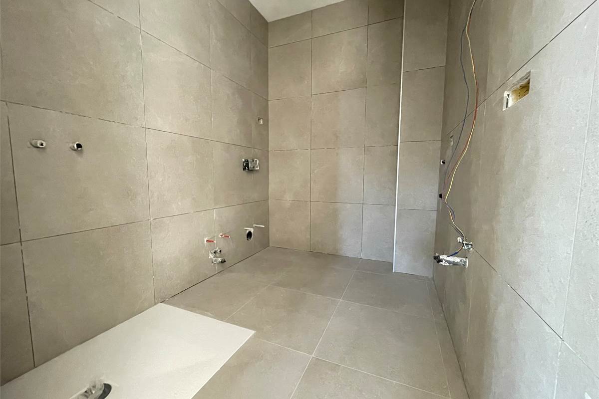 Nuovo trilocale con giardino 