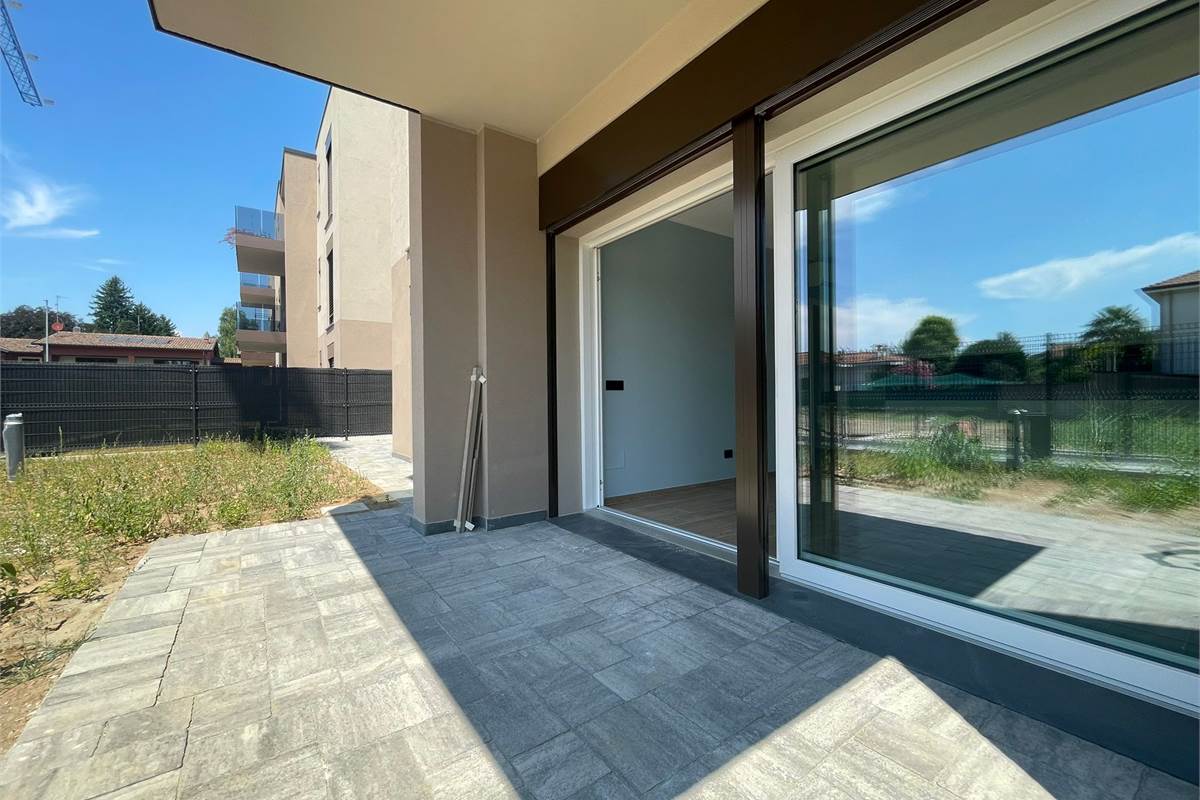 Nuovo bilocale con giardino e box