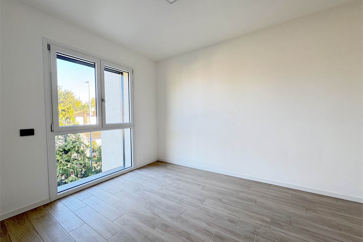 Trilocale con terrazzo e box