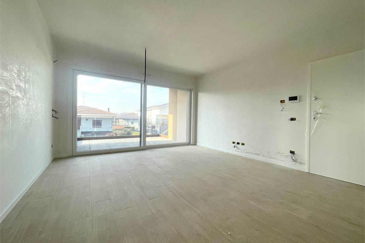 Nuovo bilocale con giardino e box