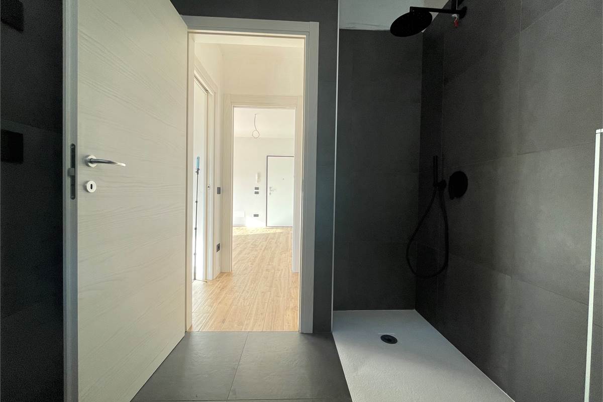 Nuovo bilocale con giardino e box