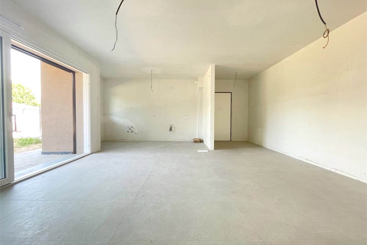 Nuovo trilocale con giardino e box