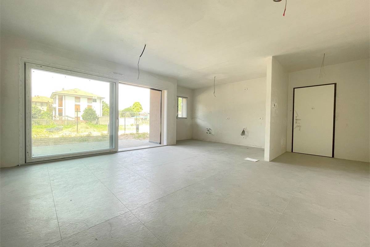 Nuovo trilocale con giardino e box