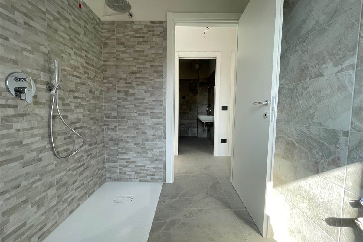 Nuovo trilocale con giardino e box