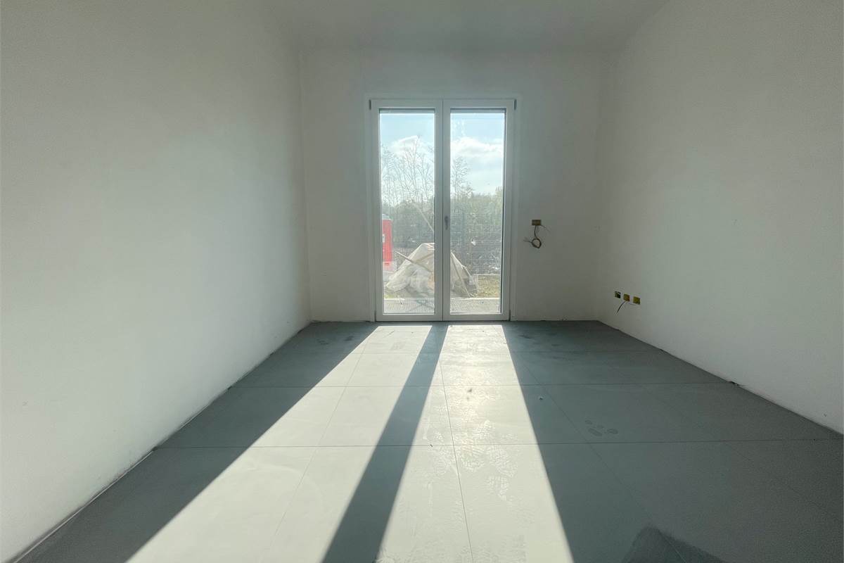 Nuovo trilocale con giardino