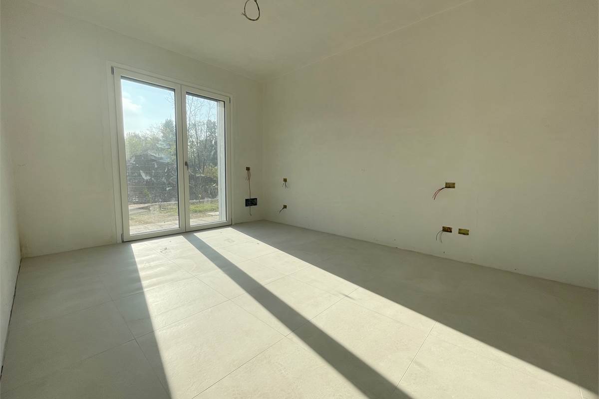 Nuovo trilocale con giardino