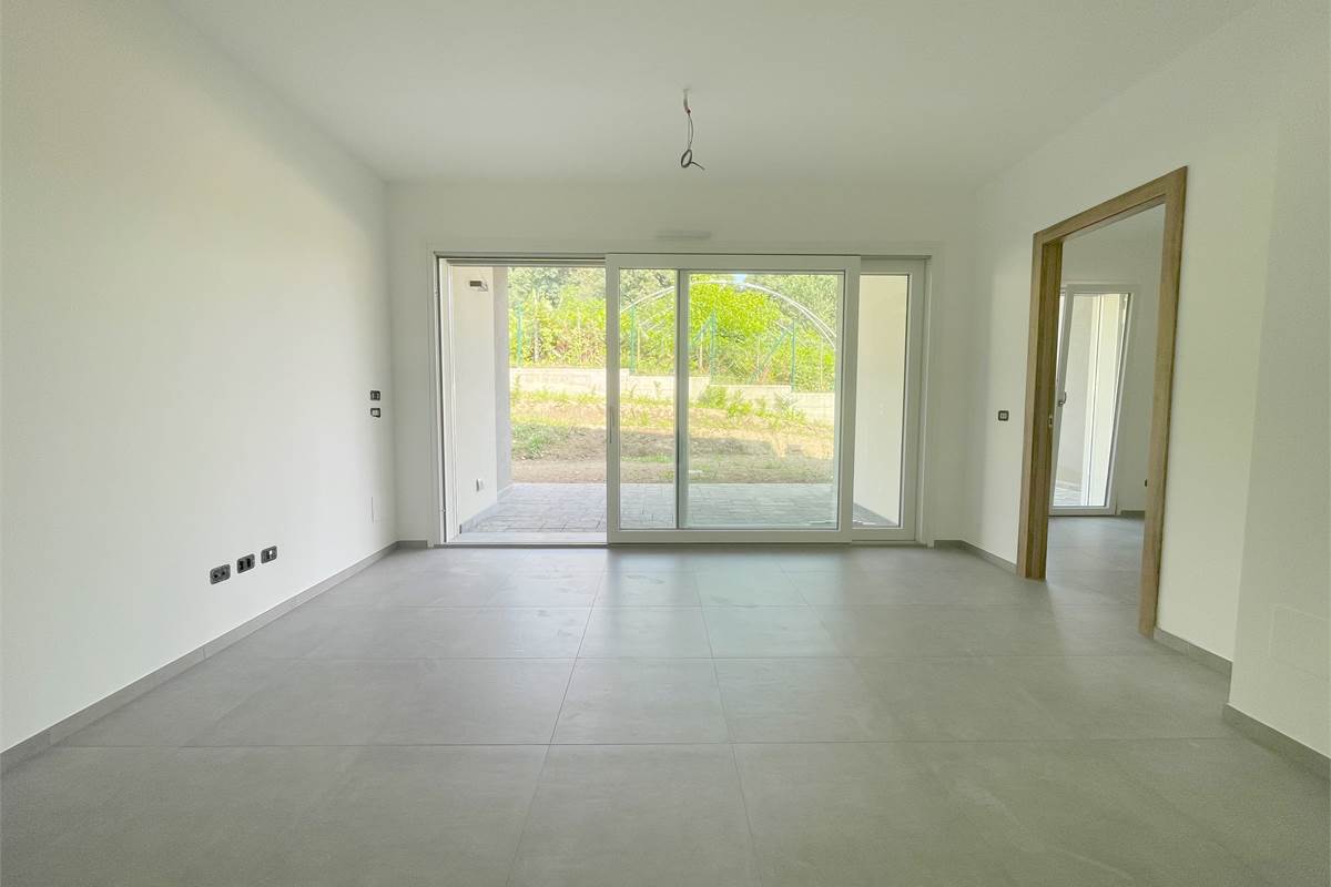 Nuovo trilocale con giardino