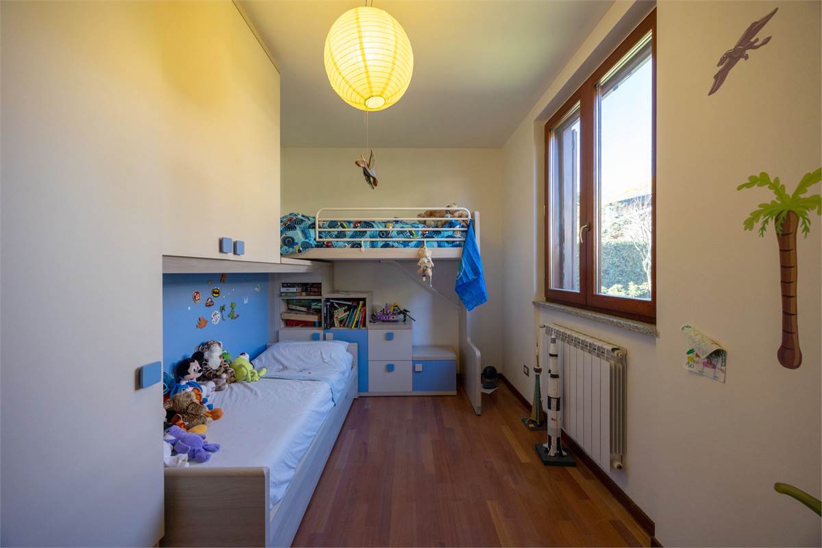 Trilocale con giardino e box doppio